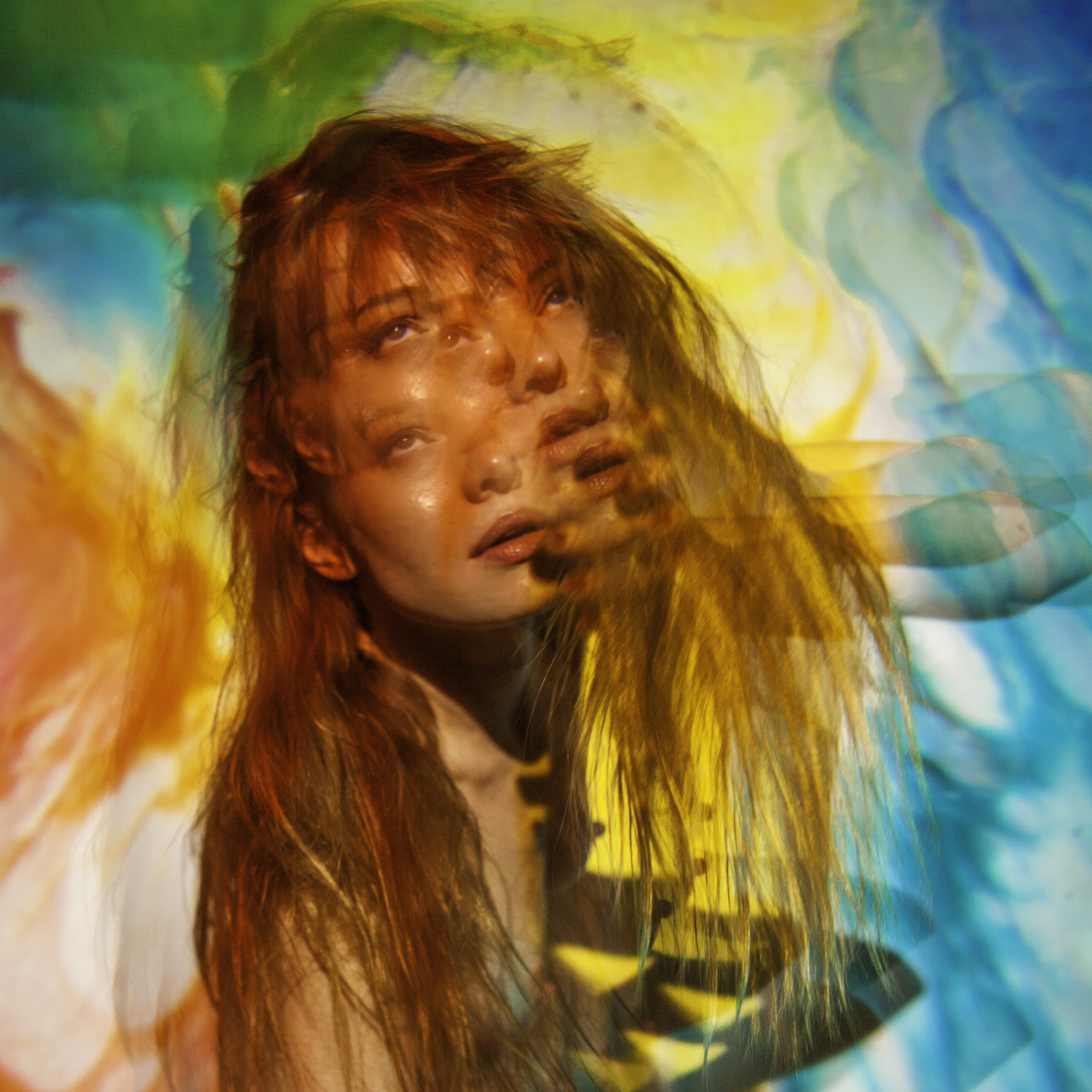A figure fractured into simultaneous states through projected color